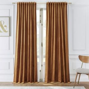 Set of 2 golden brown velvet curtains. W52”xL96”. 2 sets available for purchase.
